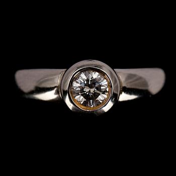 RING, briljantslipad diamant ca 0.30 ct uppskattningsvis W/si. 18K vitguld. Vikt 7,3 g.