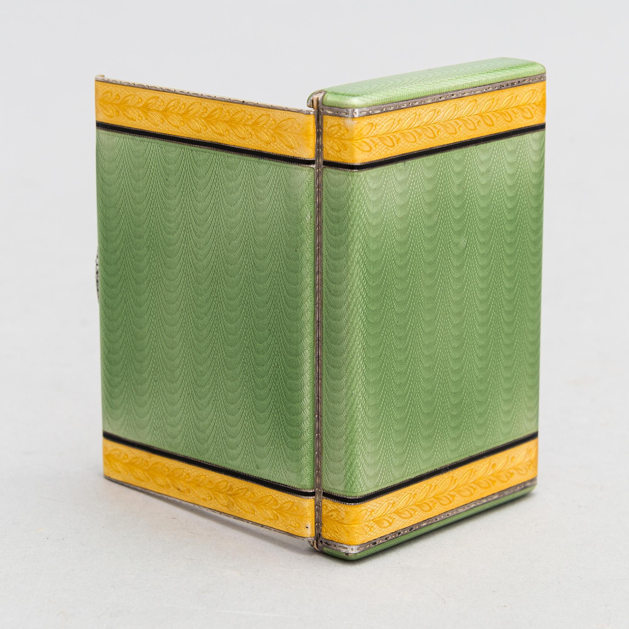 A gilded silver cigarette case with enamel and rose-cut diamonds. Moscow, early 20th century.