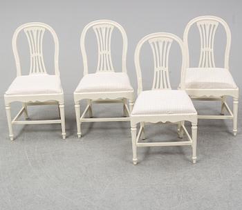 Four early 20th Century painted Gustavian style chairs.