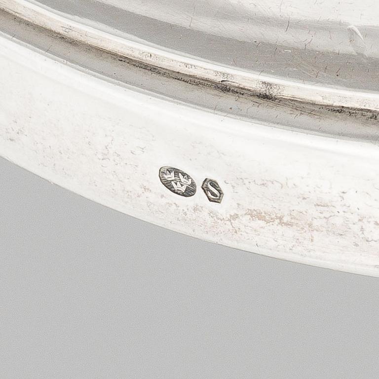 A pair of Rococo style sterling silver candelsticks, Swedish import mark.