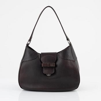 Prada, a brown leather bag.
