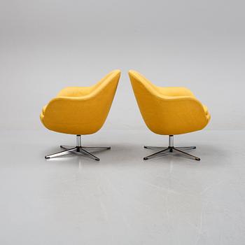 A pair of easy chairs, mid 20th Century.