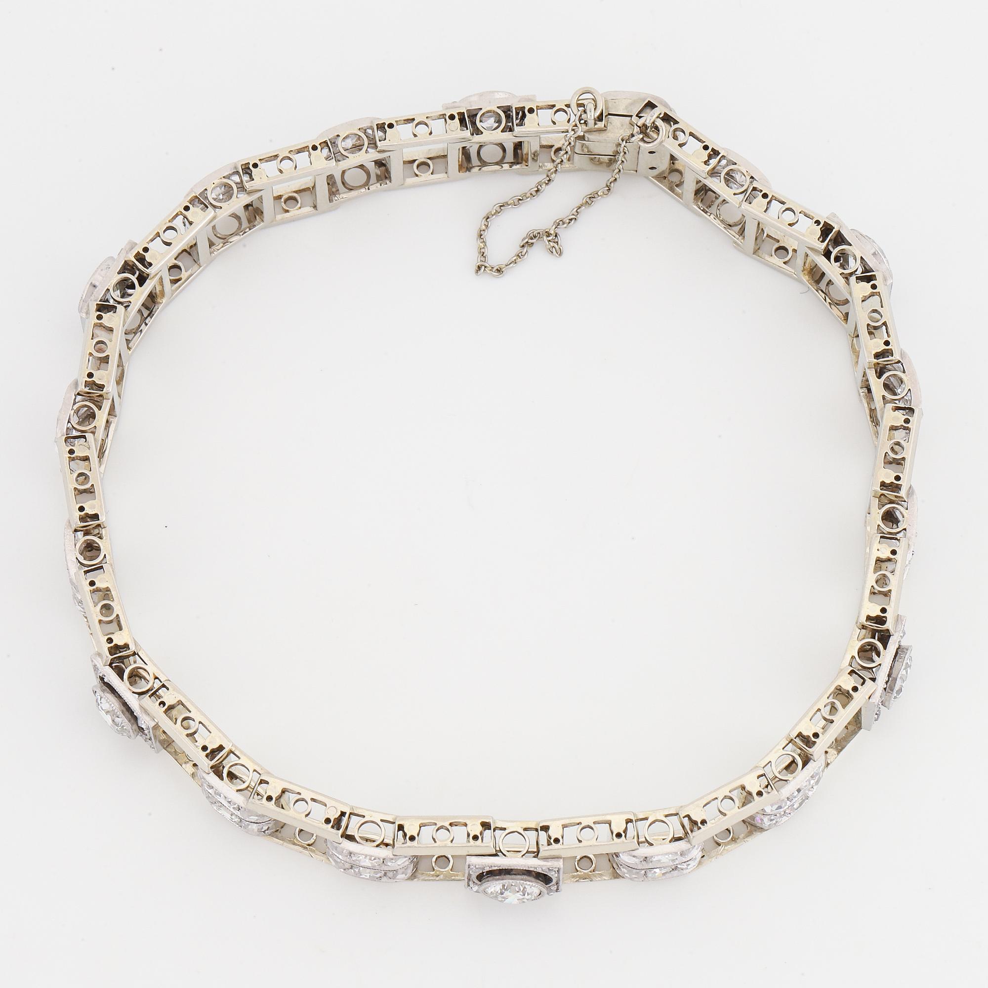 An 18K white gold bracelet set with old- and rose-cut diamonds.