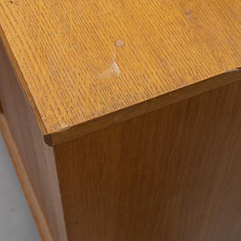 An oak veneered cabinet and chest of drawers, later part of the 20th Century.