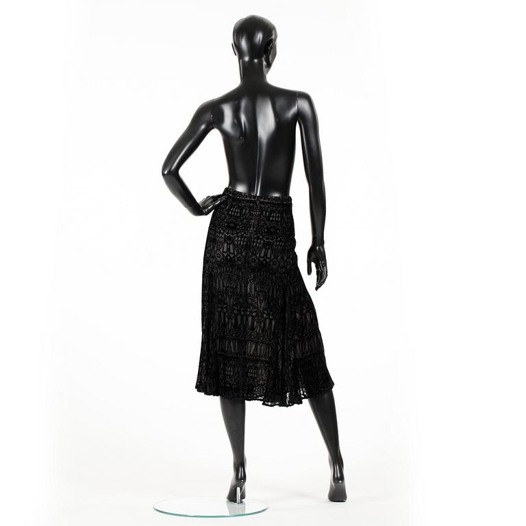 ALEXANDER MCQUEEN, a black skirt.