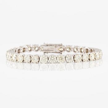 Tennis bracelet, 18K white gold with brilliant-cut diamonds.