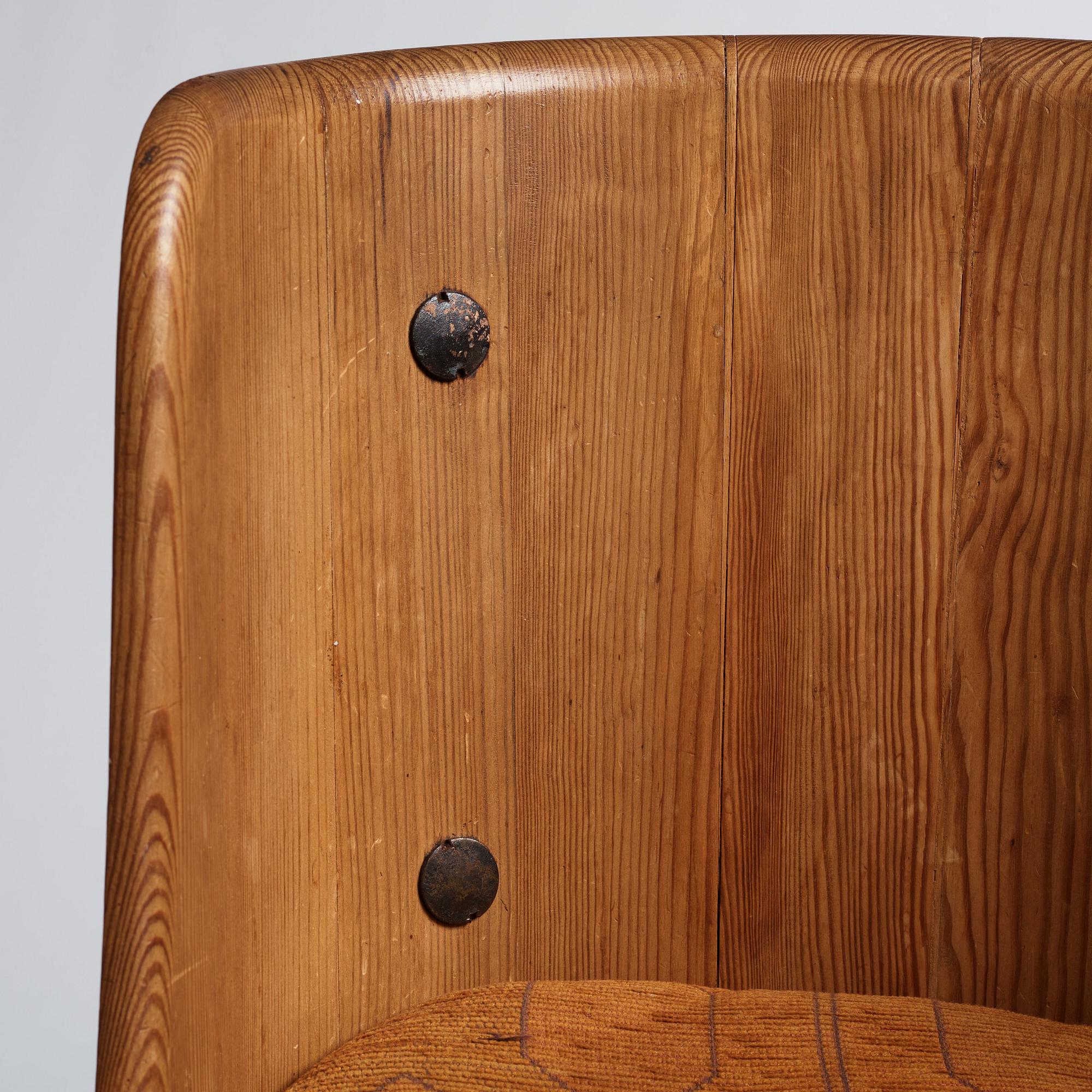 Axel Einar Hjorth, a pair of stained pine 'Lovö' chairs, Nordiska Kompaniet, Sweden 1930s.