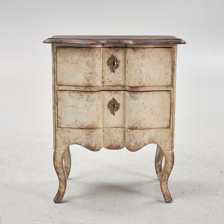 A painted Baroque style chest of drawers, early 20th Century.