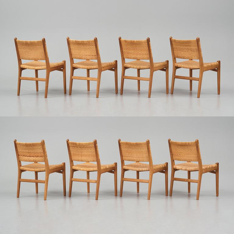 Hans J. Wegner, a set of eight "CH31" oak and rattan chairs, Carl Hansen & Son, Denmark 1950s.