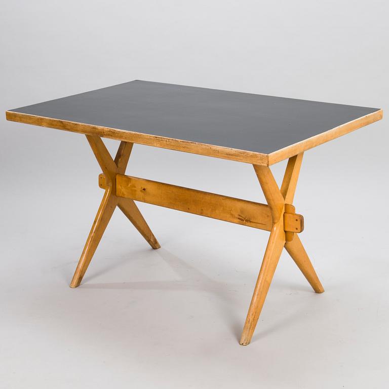 ILMARI TAPIOVAARA, A 1940s X-LEGGED TABLE for Keravan Puuteollisuus, Finland.