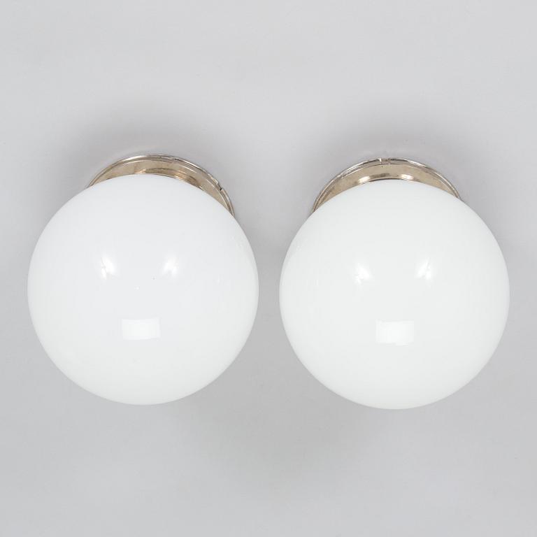 A pair of 1930s ceiling lights.
