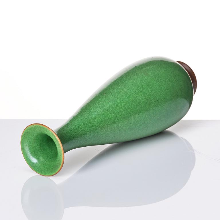 A Chinese apple-green-glazed vase, Qing dynasty.