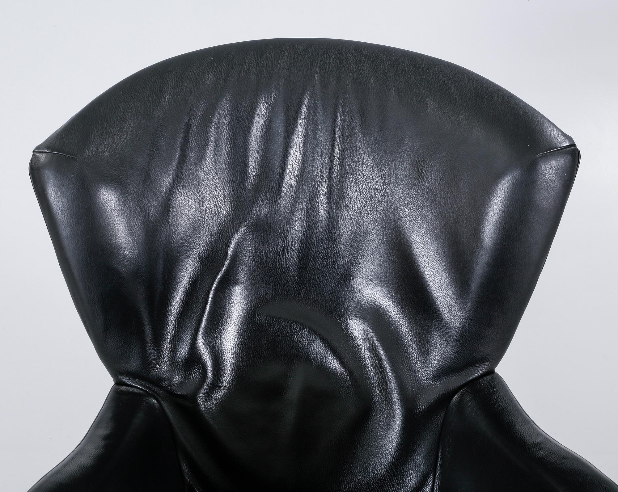 A lounge chair with foot stool by Gijs Papavoine for Montis, model "Castor", late 20th century.