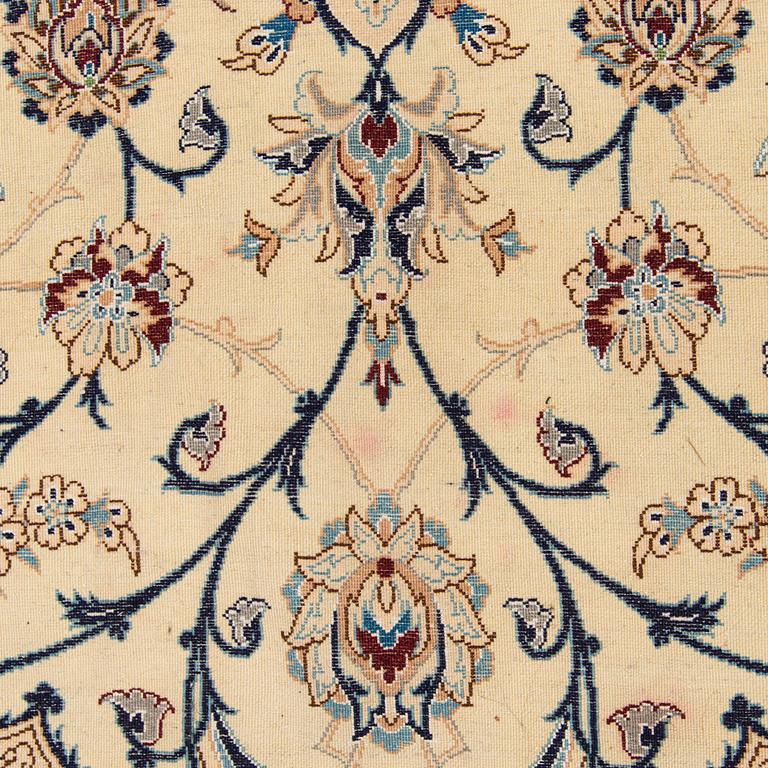 A carpet, Nain, part silk S.K 9LAA. Circa 352x248 cm.