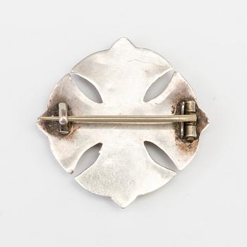 A BROOCH set with jasper and heliotrope.