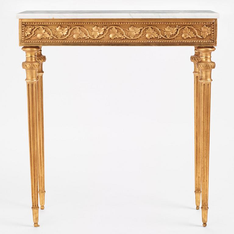 A late Gustavian carved giltwood and marble console table attributed to P. Ljung (1743-1819).