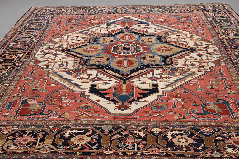 A carpet, antique Heriz, a so-called Serapi, ca 360 x 321 cm.