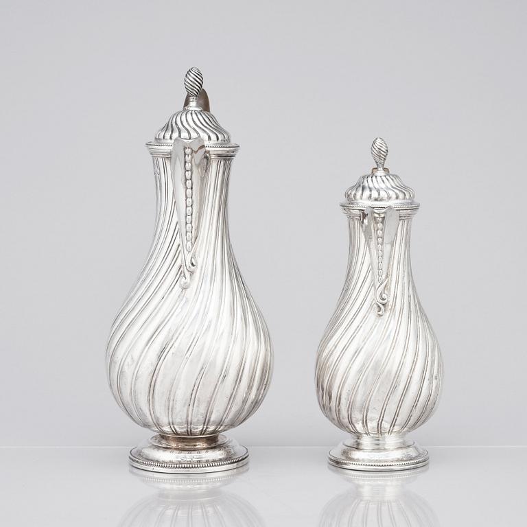 A Victorian silver coffee pot and a milk pot, Martin Hall & Co Ltd, London 1878 and Charles Stuart Harris, London 1877.