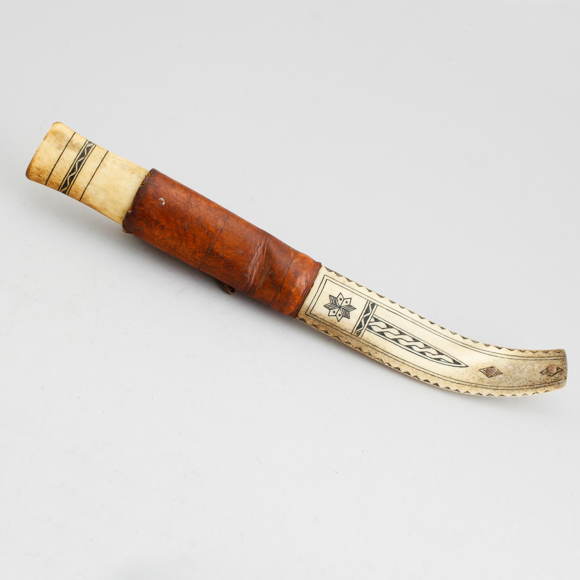 SAMEKNIV, läder och ben, 1900-talets första hälft.