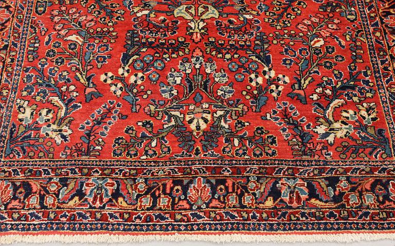 An American Sarouk rug, semi-antique, c. 200 x 142 cm.