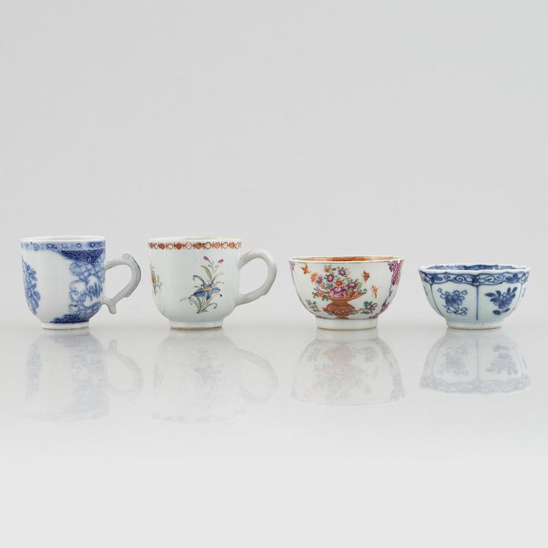 A creamer, seven porcelain cups and seven saucers, China, Qing dynasty, 18th century.