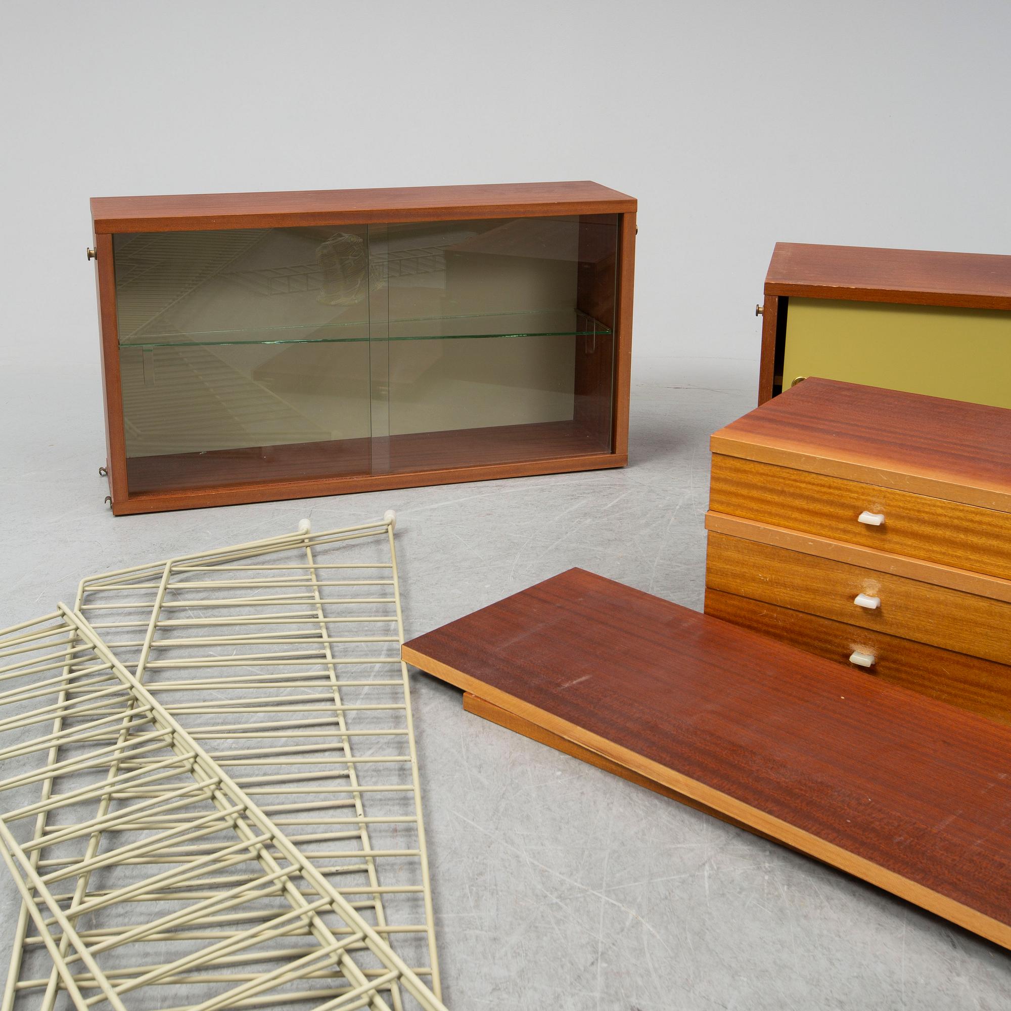 NILS & KAJSA STRINNING, a 'String' mahogany veneered shelf system, 1962.