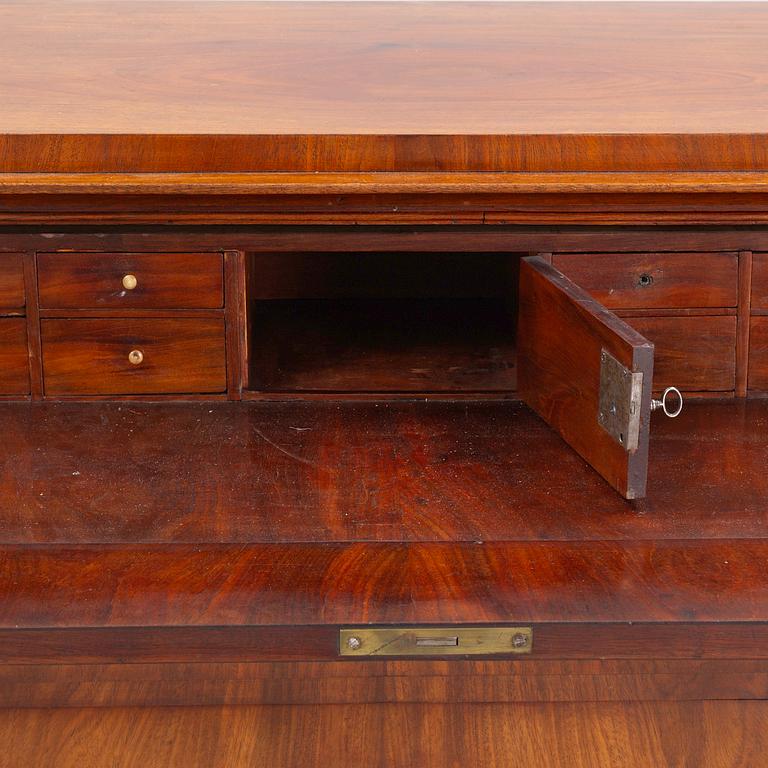 A late Gustavian mahogany writing-commode, Stockholm circa 1800.