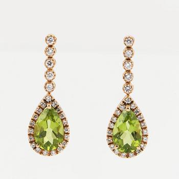 Peridot and brilliant-cut diamond earrings.