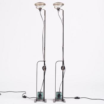 Achille Castiglioni, & Pier Castiglioni, a pair of "Toio" floor lamps, Flos, Italy, post 1963.