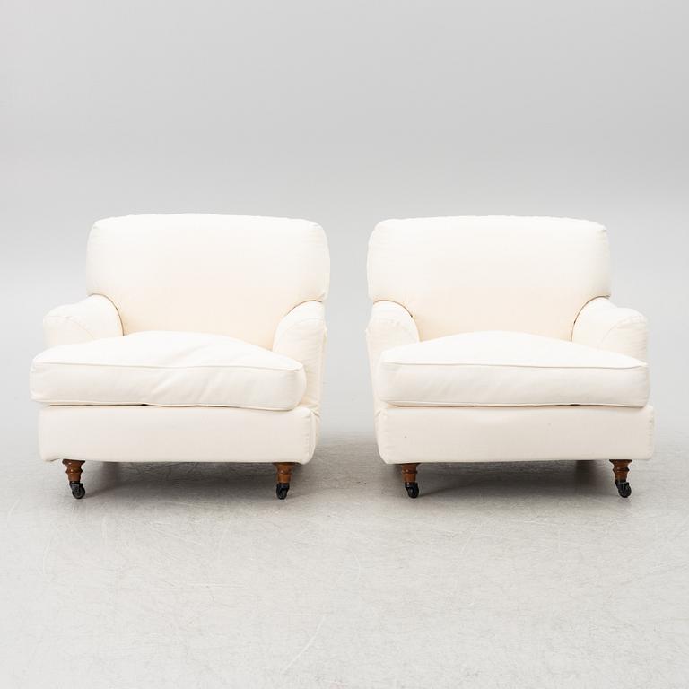 Vico Magistretti, a pair of 'Raffles' armchairs, De Padova, Italy, 21st century.