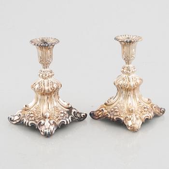 A pair of Baroque style silver candlesticks, Swedish import mark, 20th Century.