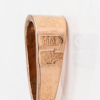 A 14K gold cross pendant with sapphires. Russia, 21st-century.