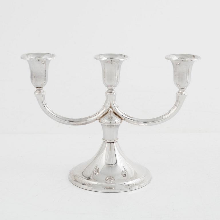 A silver candlestick, a beaker and a vase, including Gustaf Janson, CG Hallberg, Stockholm 1960.