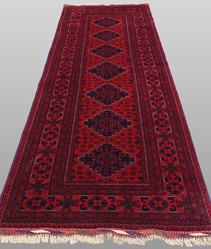 A Afghan runner carpet, 280 x 92 cm.