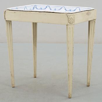 A Swedish faience tea table Rörstrand 1769.