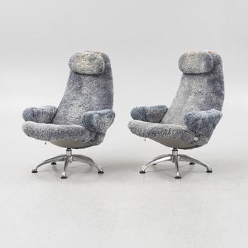 Alf Svensson, a pair of "Contourett Roto" easy chairs for Dux, Sweden.
