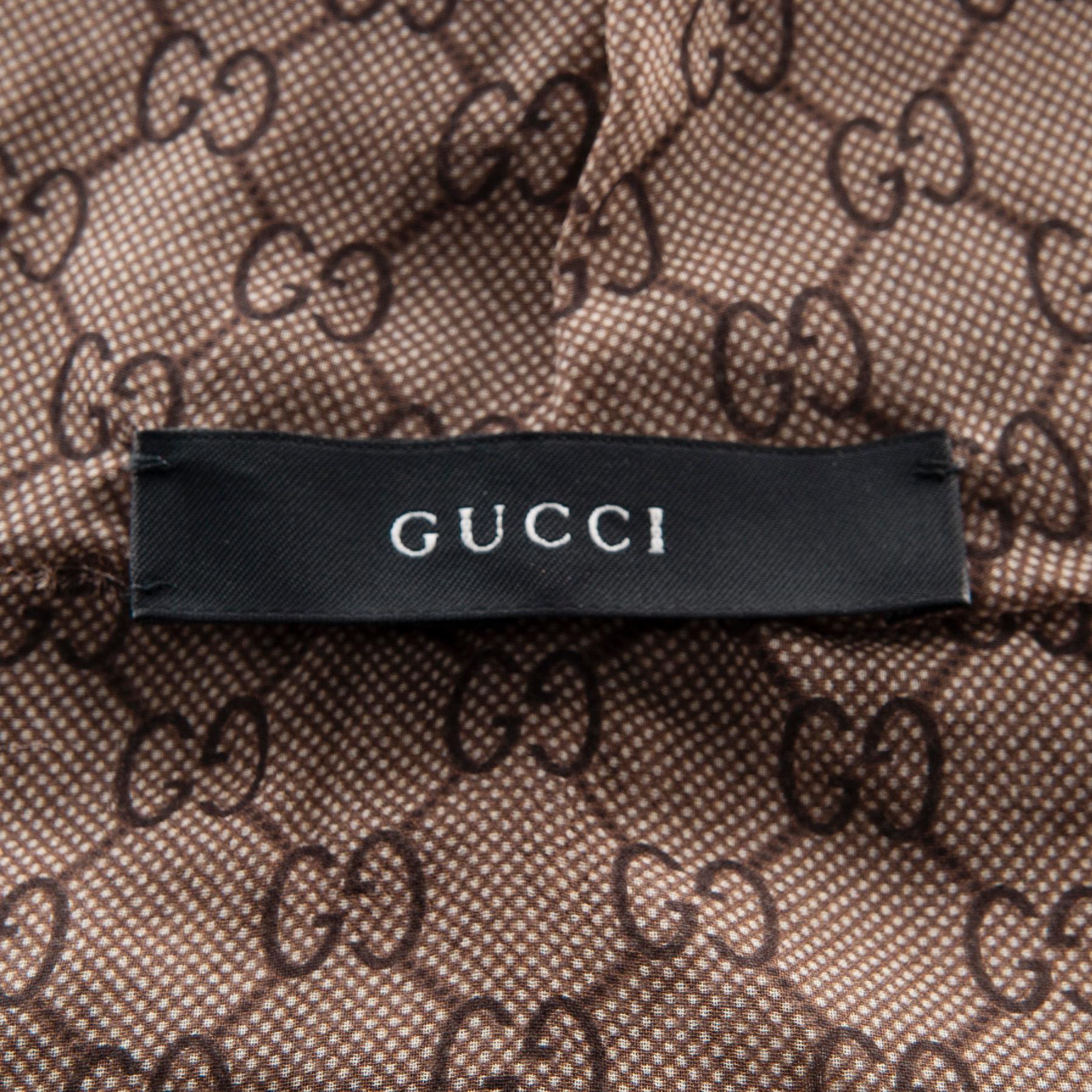 HUVA, Gucci.
