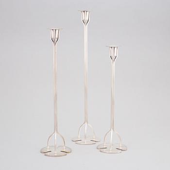 Josef Frank, a set of three silvered brass 'Klöver' candlesticks for Firma Svenskt Tenn, the model designed 1952.