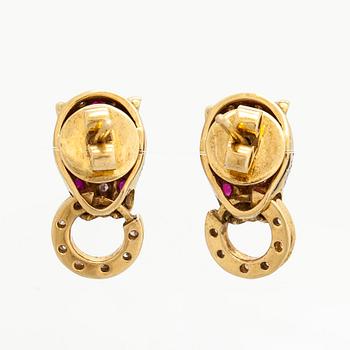 Korvakorut, 18K kultaa, rubiineja ja timantteja.