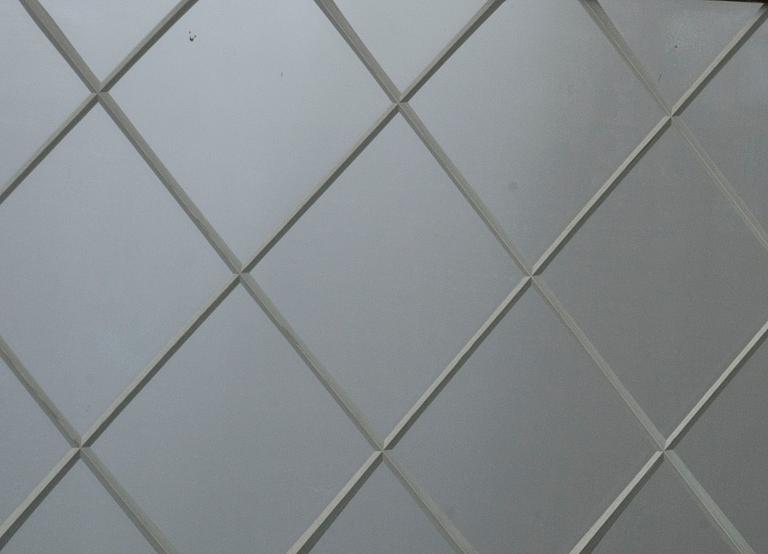 A mahogany mirror from Glas&Trä, Hovmantorp.