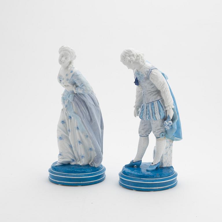 Two pocelain figurines, Meissen-like marks, probably early 20th century.