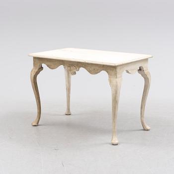 A first half of the 20th century rococo style table.