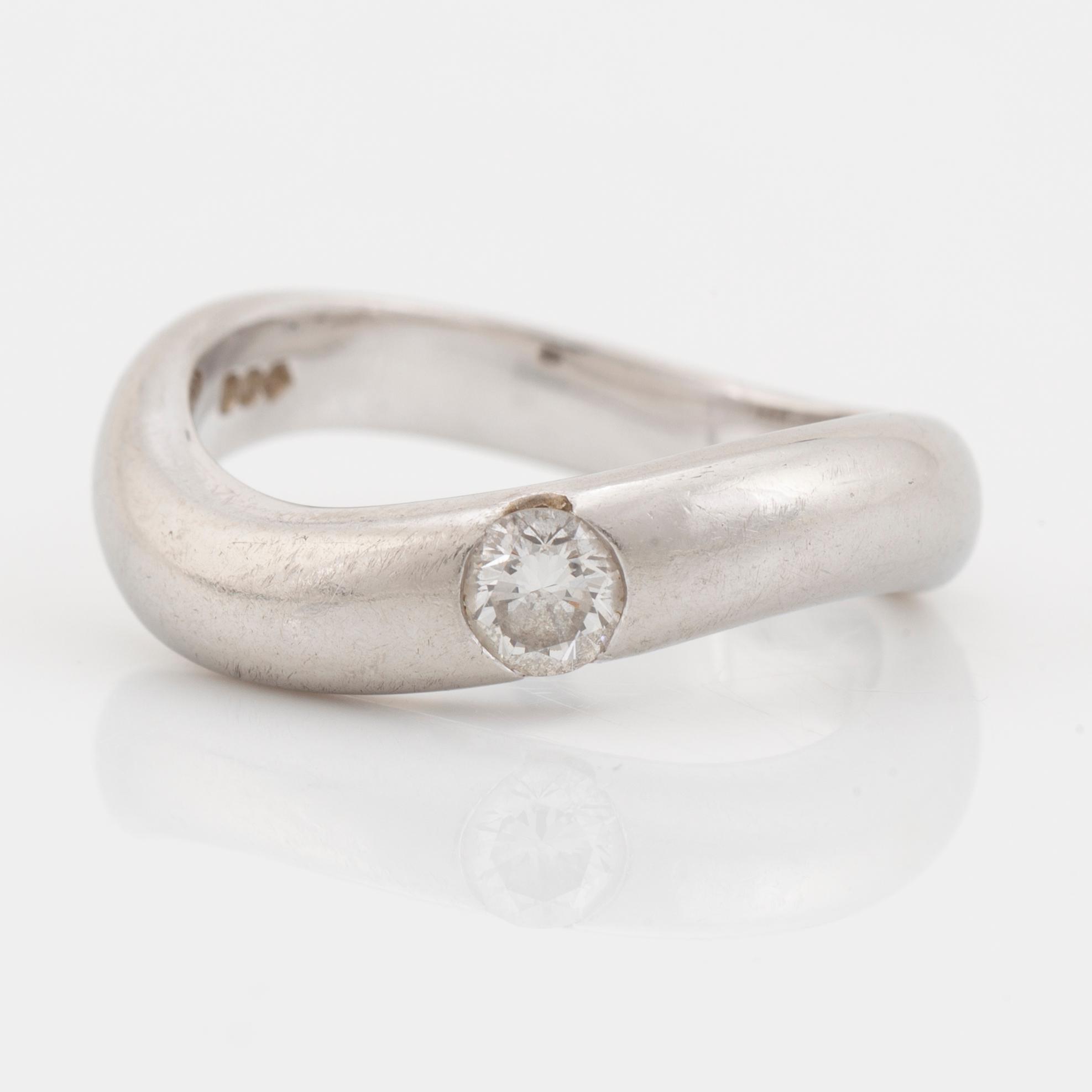 Platinum and brilliant cut diamond ring.