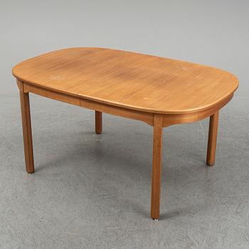 A five-piece walnut 'Ambassadör' dining suite by Carl Malmsten.