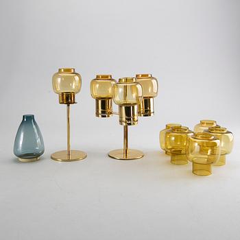 HANS-AGNE JAKOBSSON, a set of two brass candle sticks and extra glass.