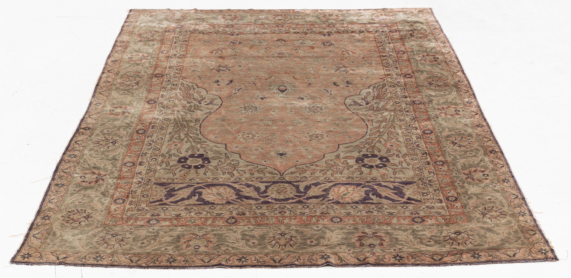 A Turkish rug, c. 185 x 125 cm.
