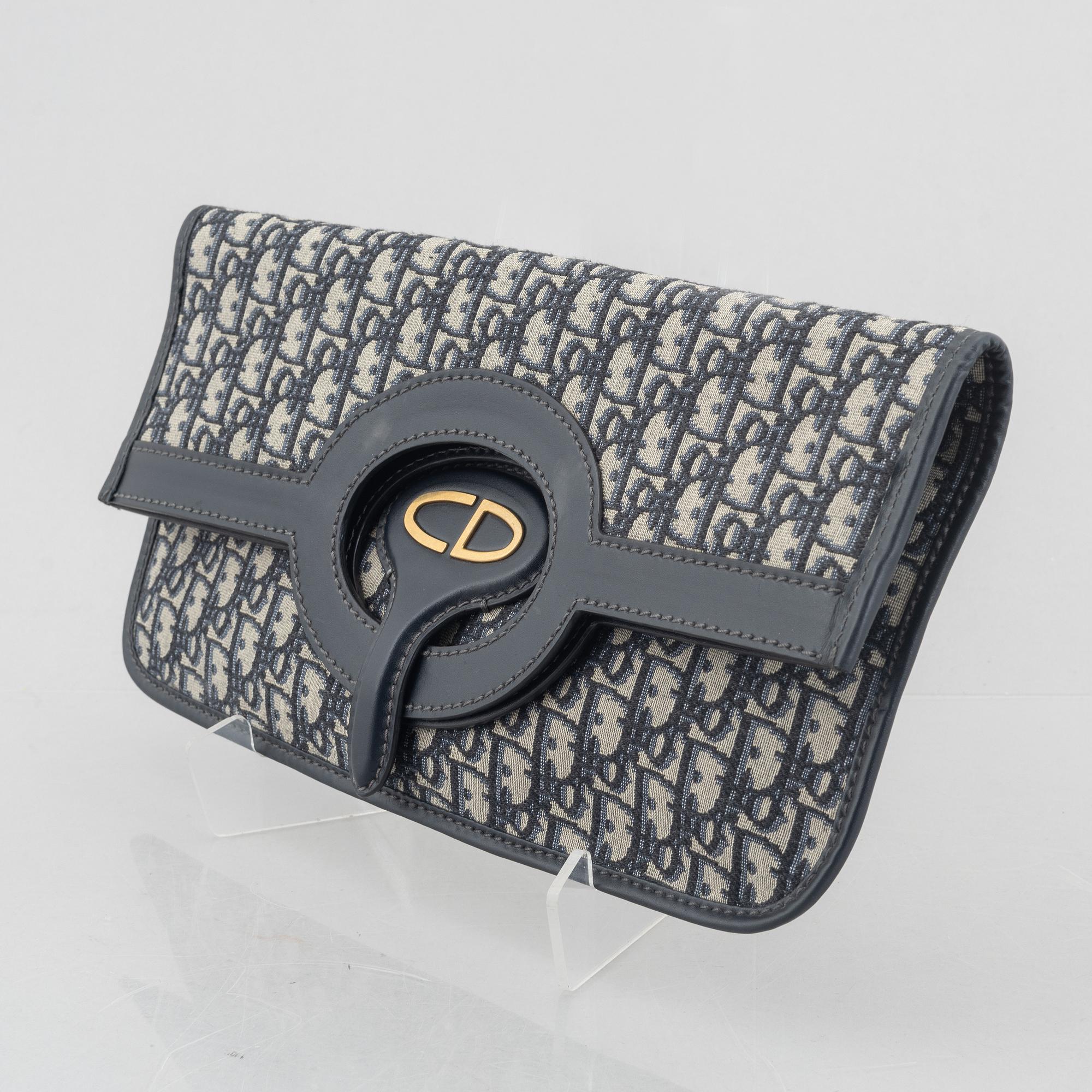 Christian Dior, bag/clutch, "Oblique fold-over convertible clutch".
