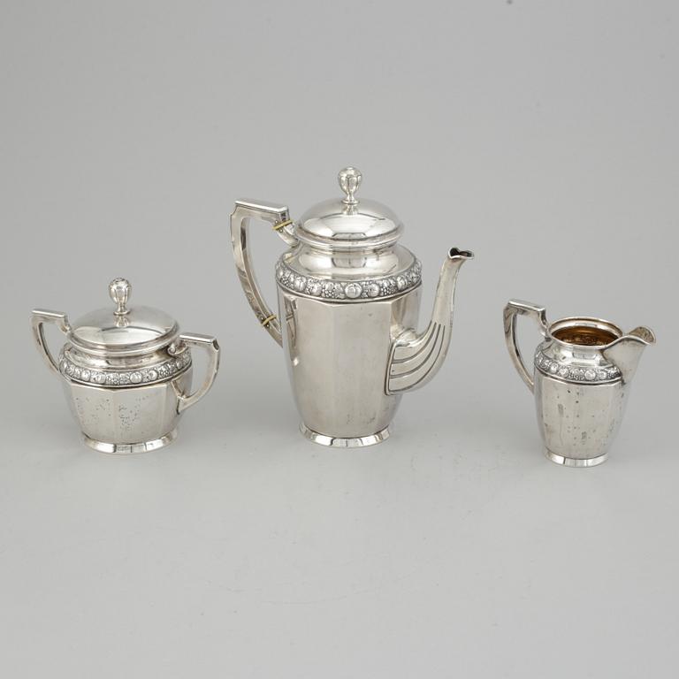 A three pieces silver coffee service from CG Hallberg, Stockholm 1916.