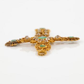 A cross in 14K gold set with faceted emeralds and old-cut diamonds, likely 18th century.