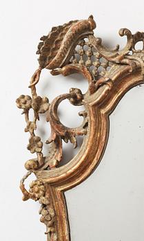 A gilt Rococo mirror, 18th Century.